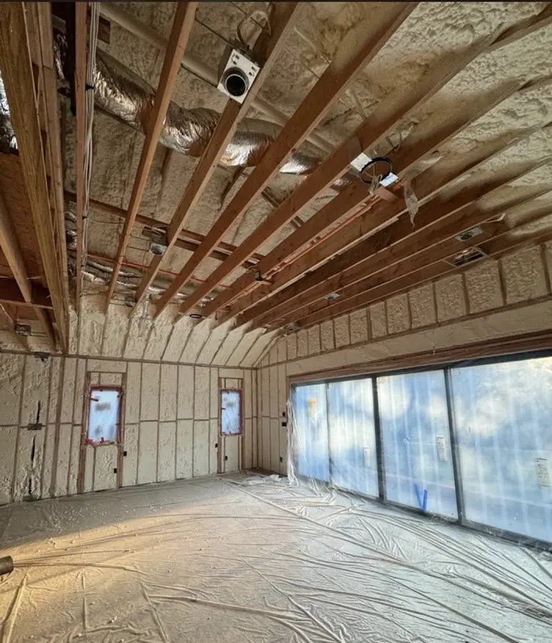 Interior walls and ceiling insulated with spray foam during new construction in Moorefield